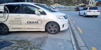 Cougar car on footpath