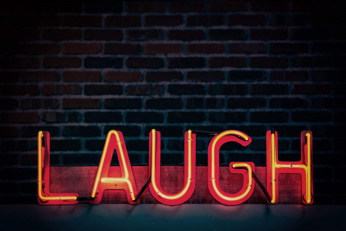 laugh neon light signage turned on 1115680